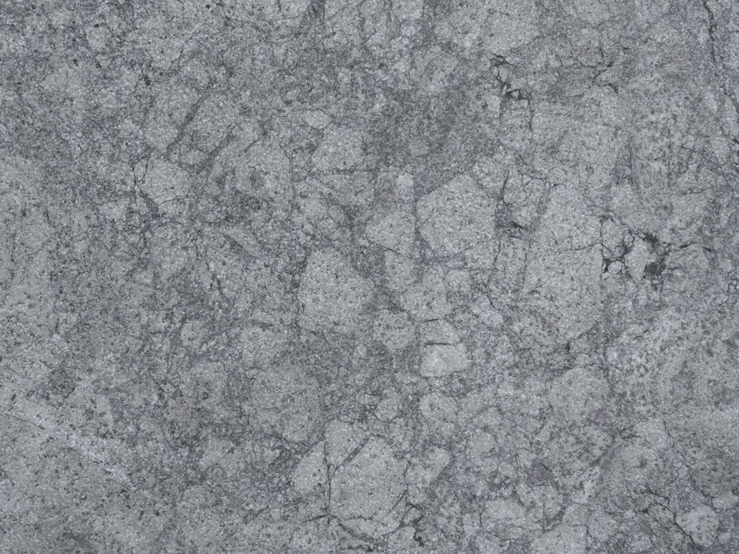 Marble Granite and marble slabs arranged in a warehouse showroom